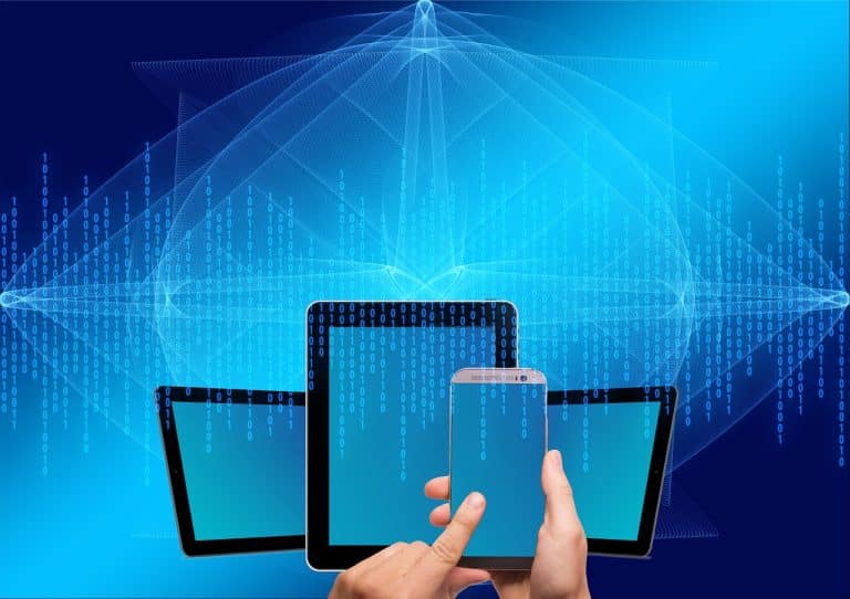 A hand manipulates mobile devices in front of floating, stylized binary