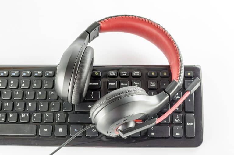 A gaming headset on a keyboard