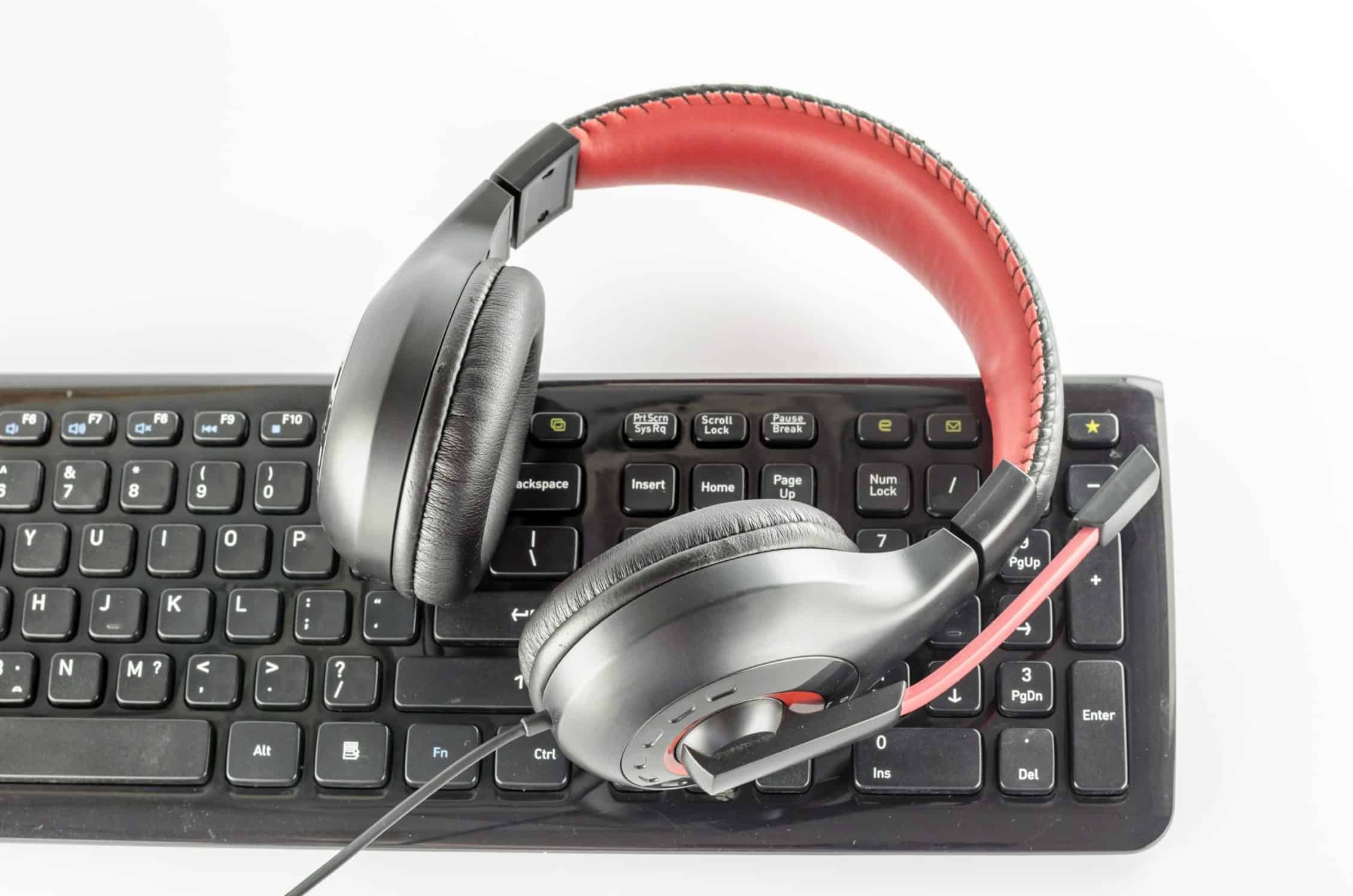 A gaming headset on a keyboard