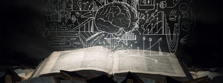 A book lies open with a stylized brain hovering over.